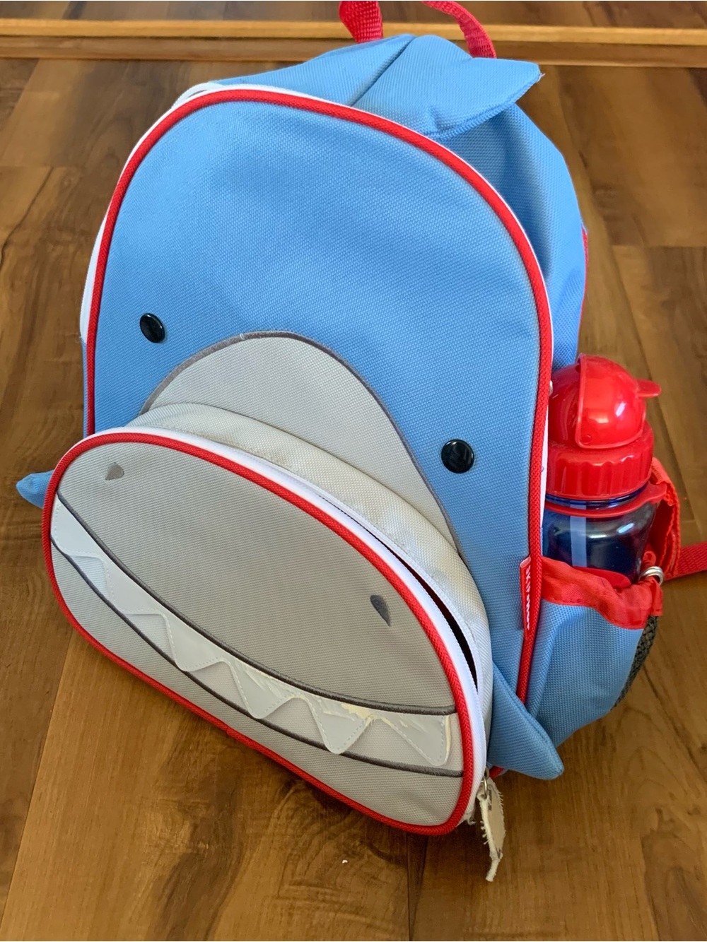 Skip Hop Light Blue Shark Backpack with Red Accents